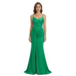 Front view of the Elara Ruched Jersey Trumpet Gown showcasing the sleek V-neckline, delicate spaghetti straps, side ruching for a flattering silhouette, high front slit, and flowing trumpet skirt in luxurious jersey fabric.