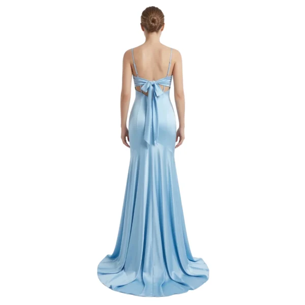 Detailed back view of the Genevieve Jersey Mermaid Gown highlighting the open back with bow tie detail and hidden zipper closure, showcasing the smooth jersey fabric and elegant sweep train.