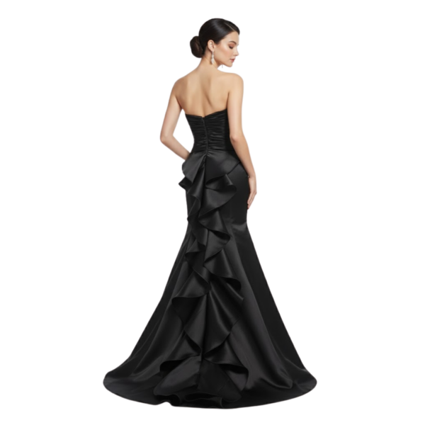 Detailed back view of Margot Heavy Satin Mermaid Gown highlighting the low back design with cascading ruffle details along the hips and sweep train, accented by a secure back zipper closure.