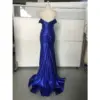 Back view of the Serena Royal Blue mermaid gown in Stretch Satin featuring intricate ruching, dramatic sweep train, off-the-shoulder cap sleeves, and concealed back zipper closure.