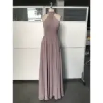 Front view of Leona Chiffon Halter Gown in soft lavender featuring elegant high halter neckline, ruched bodice, natural waistband and flowing A-line pleated skirt in luxurious chiffon fabric