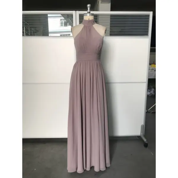 Front view of Leona Chiffon Halter Gown in soft lavender featuring elegant high halter neckline, ruched bodice, natural waistband and flowing A-line pleated skirt in luxurious chiffon fabric