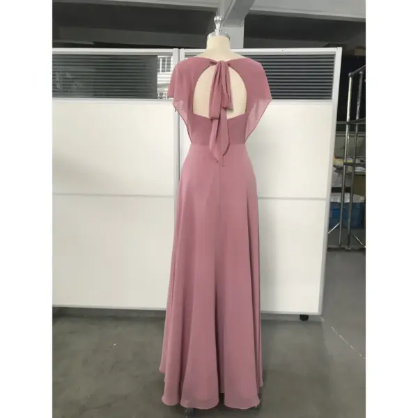 Detailed back view of Madeleine in Dusky Rose Chiffon A-Line Dress highlighting the open back with romantic tie bow, sheer flutter sleeves, and concealed zipper closure along the structured waist