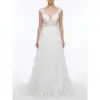 Stunning Ivory Ramona bridal ball gown crafted from delicate embroidered tulle featuring a plunging sweetheart neckline with intricate lace appliqués, cap sleeves and a flowing layered skirt that creates ethereal bridal romance.