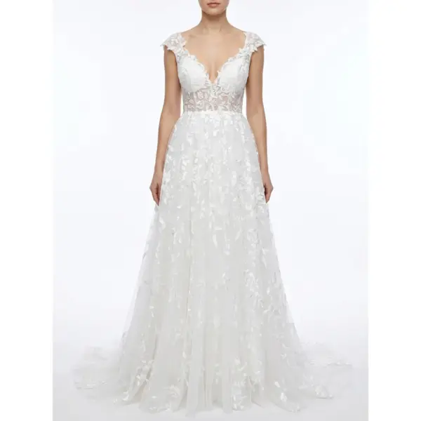 Stunning Ivory Ramona bridal ball gown crafted from delicate embroidered tulle featuring a plunging sweetheart neckline with intricate lace appliqués, cap sleeves and a flowing layered skirt that creates ethereal bridal romance.