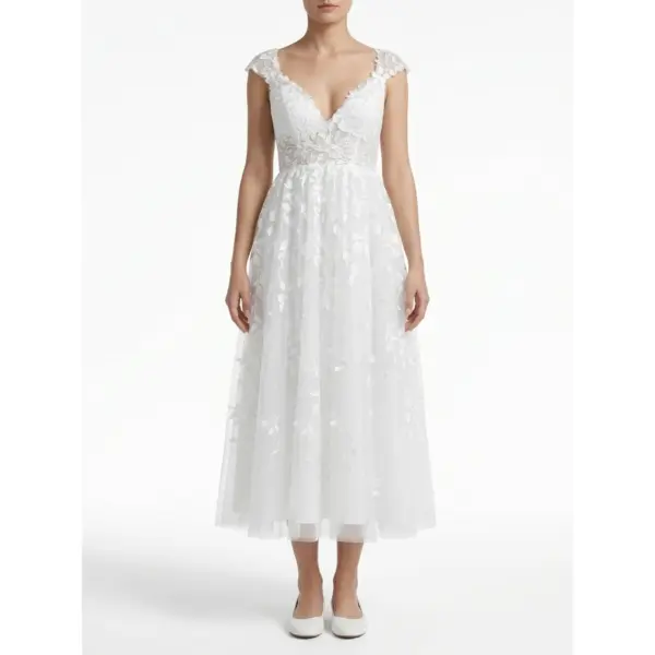 Sarah in stunning Ivory embroidered tulle tea length bridal gown with delicate floral lace appliques, romantic V-neckline and flowing A-line silhouette that captures ethereal romance and bridal glow