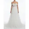 Stunning off-the-shoulder Vanessa Ivory bridal gown in delicate embroidered tulle featuring a sweetheart neckline, floral lace appliques cascading down the bodice and full ball gown skirt with ethereal layered texture.