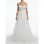 Stunning off-the-shoulder Vanessa Ivory bridal gown in delicate embroidered tulle featuring a sweetheart neckline, floral lace appliques cascading down the bodice and full ball gown skirt with ethereal layered texture.
