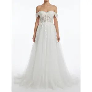 Stunning off-the-shoulder Vanessa Ivory bridal gown in delicate embroidered tulle featuring a sweetheart neckline, floral lace appliques cascading down the bodice and full ball gown skirt with ethereal layered texture.