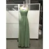 Front view of the Elowen Fern Chiffon Lace Applique A-Line Gown featuring a soft fern green hue, delicate spaghetti straps, pleated sweetheart neckline with ruched crossover bodice, and flowing chiffon A-line skirt.