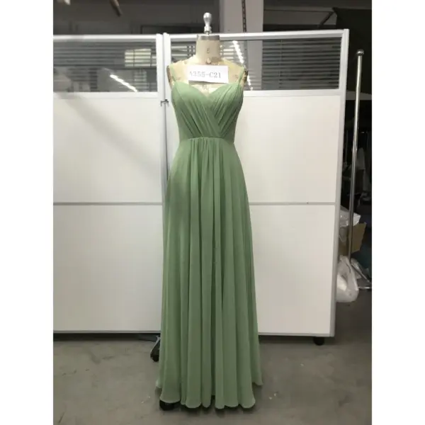 Front view of the Elowen Fern Chiffon Lace Applique A-Line Gown featuring a soft fern green hue, delicate spaghetti straps, pleated sweetheart neckline with ruched crossover bodice, and flowing chiffon A-line skirt.
