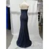Back view of the Danielle Navy Jersey Strapless Mermaid Gown showcasing a clean fitted silhouette with central zipper closure, smooth jersey drape extending into a graceful sweep train.