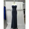 Front view of the Danielle Navy Jersey Strapless Mermaid Gown featuring a sleek strapless sweetheart neckline, fluid jersey fabric that hugs the figure, and a subtle high slit for elegant movement.
