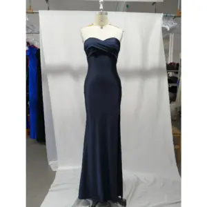 Front view of the Danielle Navy Jersey Strapless Mermaid Gown featuring a sleek strapless sweetheart neckline, fluid jersey fabric that hugs the figure, and a subtle high slit for elegant movement.
