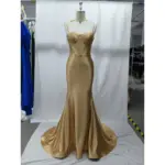 Front view of the Flavia Golden Stretch Satin Mermaid Gown featuring a sweetheart neckline with spaghetti straps, sculpted corset bodice with internal boning, and a figure-hugging mermaid silhouette in luxurious golden stretch satin that flows into a dramatic sweeping train.