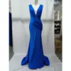 Stunning Rachel Royal Blue jersey mermaid gown featuring a deep plunging V-neckline, intricate draped bodice and cascading skirt that hugs the figure before flaring at the hem in rich, vibrant royal blue.