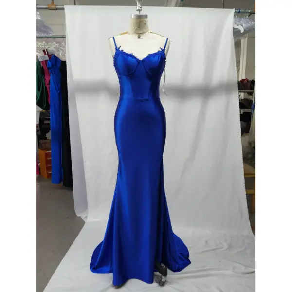 Stunning Royal Blue stretch satin mermaid dress with sweetheart neckline and delicate lace applique bodice. The luxurious fabric drapes elegantly to create a figure-flattering silhouette with a subtle high slit.