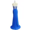 Elegant back view of the Victoire Royal Blue jersey mermaid dress showcasing delicate lace-up corset closure, sheer embroidered applique panel, and flowing sweep train that creates a sophisticated old money silhouette.