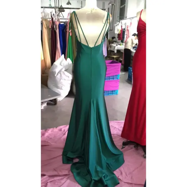 Detailed back view of Elena in Teal Jersey Mermaid Dress highlighting the strappy open back design with multiple criss-cross spaghetti straps and concealed back zipper closure along the fitted mermaid silhouette