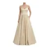 Front view of the Cécile Champagne Polyester Satin Ball Gown featuring a strapless sweetheart neckline, structured bodice with internal boning, natural waistband, and full pleated tulle-interlined skirt with convenient side pockets in a luxurious champagne hue.