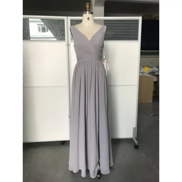 Front view of the Jolanda Silver Chiffon dress featuring a flattering ruched V-neckline, sleeveless design, and flowing A-line skirt in luxurious silver chiffon fabric that creates an elegant, ethereal silhouette.