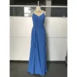 Ocean Blue chiffon gown with V-neckline, delicate spaghetti straps, ruched waist detailing, side ruffles, and high slit on a mannequin