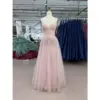 Front view of the Juliette Tulle Embroidered A-Line Gown in pale pink featuring a sweetheart neckline, intricate floral embroidery, lace appliques and sparkling glitter tulle skirt with natural waist and full A-line silhouette