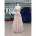 Front view of the Juliette Tulle Embroidered A-Line Gown in pale pink featuring a sweetheart neckline, intricate floral embroidery, lace appliques and sparkling glitter tulle skirt with natural waist and full A-line silhouette