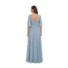 Back view of the Caroline Dusty Blue chiffon gown showcasing a deep V-back with concealed zipper, matching flutter sleeves, and a gracefully pleated A-line skirt that creates beautiful movement and ethereal flow in the soft dusty blue fabric.