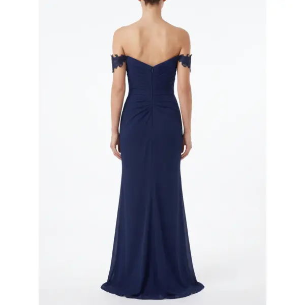 Back view of the Lisa Navy Chiffon Sheath Gown showcasing a V-back with central zipper, ruched detailing through the bodice and hips, and the fluid drape of the lightweight chiffon fabric.