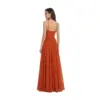 Back view of the Sandra Paprika chiffon gown showcasing delicate spaghetti straps, open back design with center zipper, and the full sweep of the pleated A-line skirt in luxurious flowing fabric.