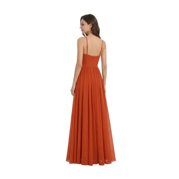 Back view of the Sandra Paprika chiffon gown showcasing delicate spaghetti straps, open back design with center zipper, and the full sweep of the pleated A-line skirt in luxurious flowing fabric.