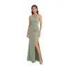 Model wearing the Tara Sage Green Chiffon Halter Mermaid Gown featuring a pleated halter neckline with keyhole cutout, ruched waist, and dramatic high slit that reveals the leg. The flowing sage green chiffon fabric drapes elegantly for a sophisticated look.
