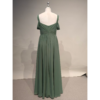 Back view of the Angela Eucalyptus chiffon gown showcasing a flattering V-back with concealed zipper, pleated waistband detail, and the full sweep of the flowing A-line skirt in luxurious eucalyptus green chiffon fabric.