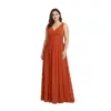 Model wearing the Iolanda Paprika chiffon V-neck A-line gown featuring a flattering surplice bodice with ruching, pleated empire waistband, and flowing floor-length skirt in rich warm paprika hue.