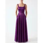 Front view of the Hortense in rich Eggplant Heavy Satin featuring a structured square neckline, pleated corset bodice with internal boning, and a flowing A-line skirt with functional side pockets.
