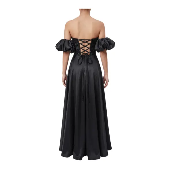 Back view of the Alix Black Stretch Satin Embroidered A-Line Gown showcasing the dramatic lace-up corset back with criss-cross detailing, beaded embroidery appliqué, puff sleeves, and flowing stretch satin A-line skirt.