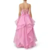 Back view of the Ashley Candy Pink Organza Tiered Ball Gown showcasing an intricate lace-up corset back with delicate crisscross detailing, a feminine bow accent, and the full dramatic sweep of the tiered organza ruffle skirt.