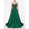 Stunning model wearing the Barbara Hunter Green stretch satin ball gown featuring a square neckline with delicate spaghetti straps, heavily beaded and embroidered sheer bodice with intricate lace appliqué, and a voluminous flowing A-line skirt that cascades dramatically to the floor.