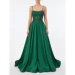 Stunning model wearing the Barbara Hunter Green stretch satin ball gown featuring a square neckline with delicate spaghetti straps, heavily beaded and embroidered sheer bodice with intricate lace appliqué, and a voluminous flowing A-line skirt that cascades dramatically to the floor.