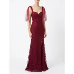 Front view of the Joanna Burgundy Embroidered Tulle Mermaid Gown featuring a sweetheart neckline, intricate floral lace appliqués with delicate beading and sequins throughout the fitted bodice and hips, a thigh-high slit, and dramatic detachable burgundy tulle flutter sleeves on a model.